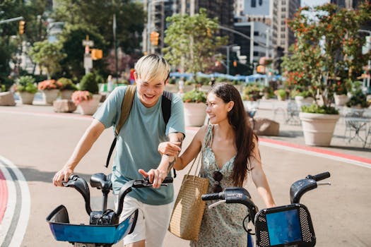 happy friends biking in the city