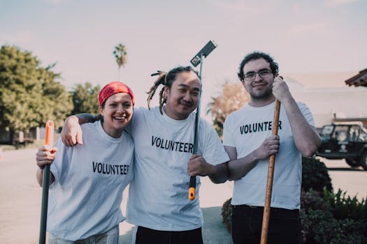 group of volunteers cleaning a park